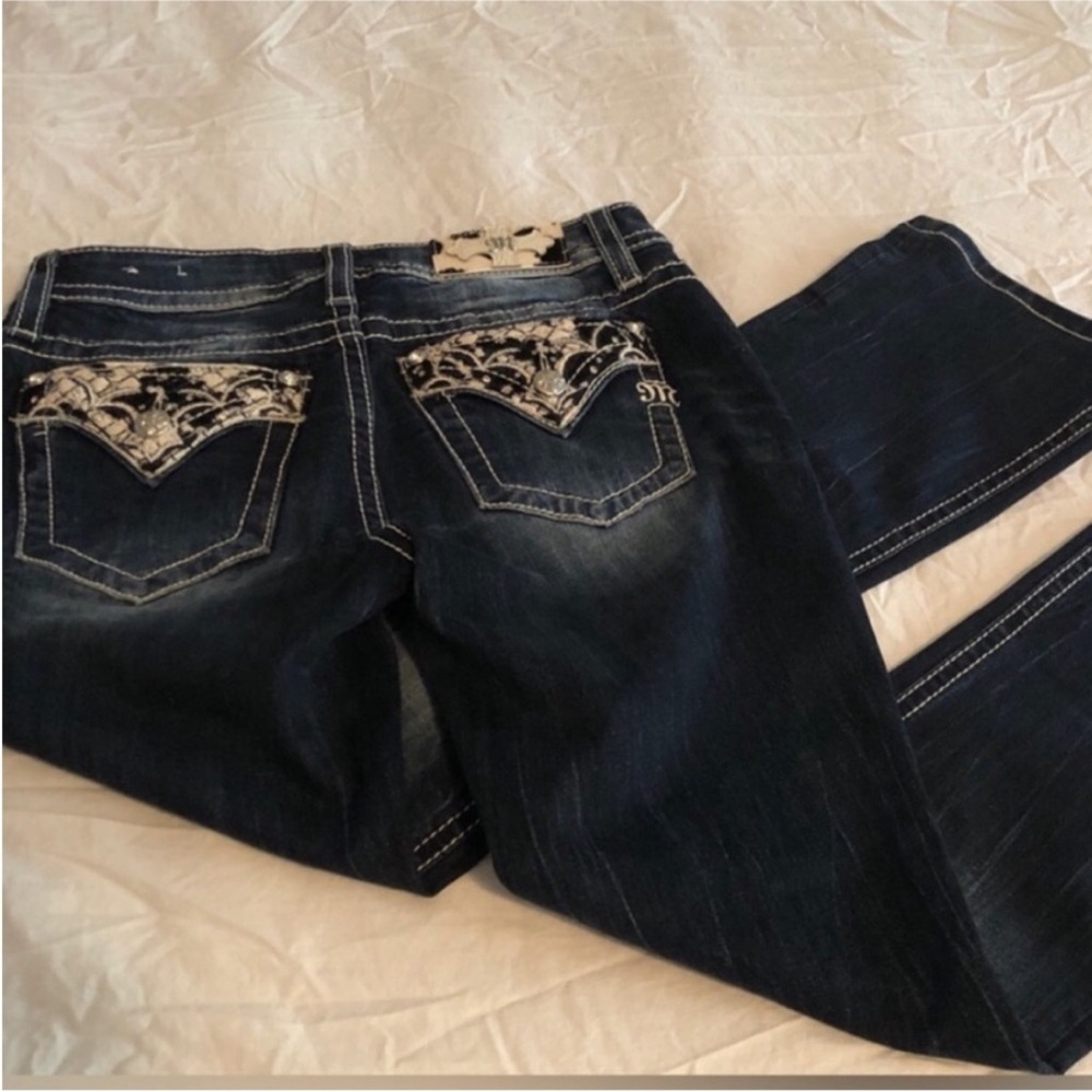 Miss Me bootcut jeans. Size 27. Cow print. Excellent condition